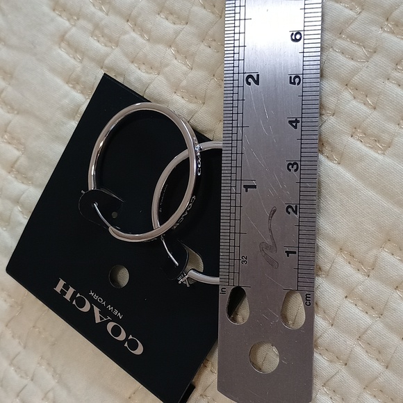 Coach Silver Tone Hoop Earrings - Picture 5 of 8